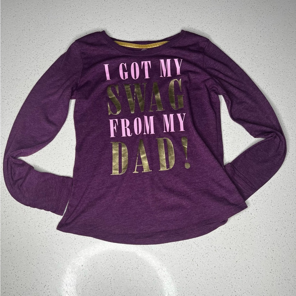 Girls SWAG long sleeve T-Shirt. Purple with gold writing. Size 10/12.